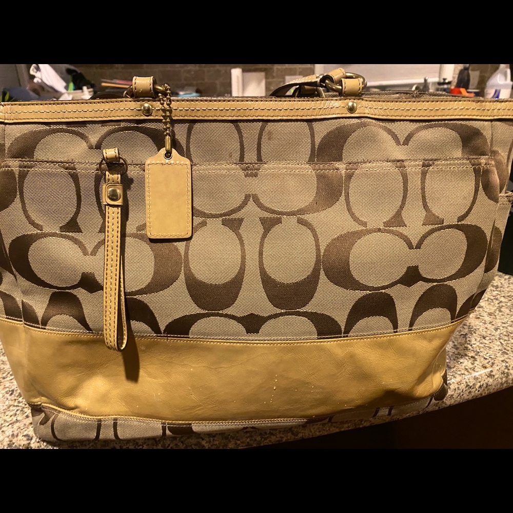 Coach- Extra Large canvas tote with leather trim.